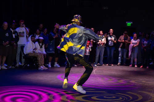 Aaron at DBR dancer on stage in dance battle royale