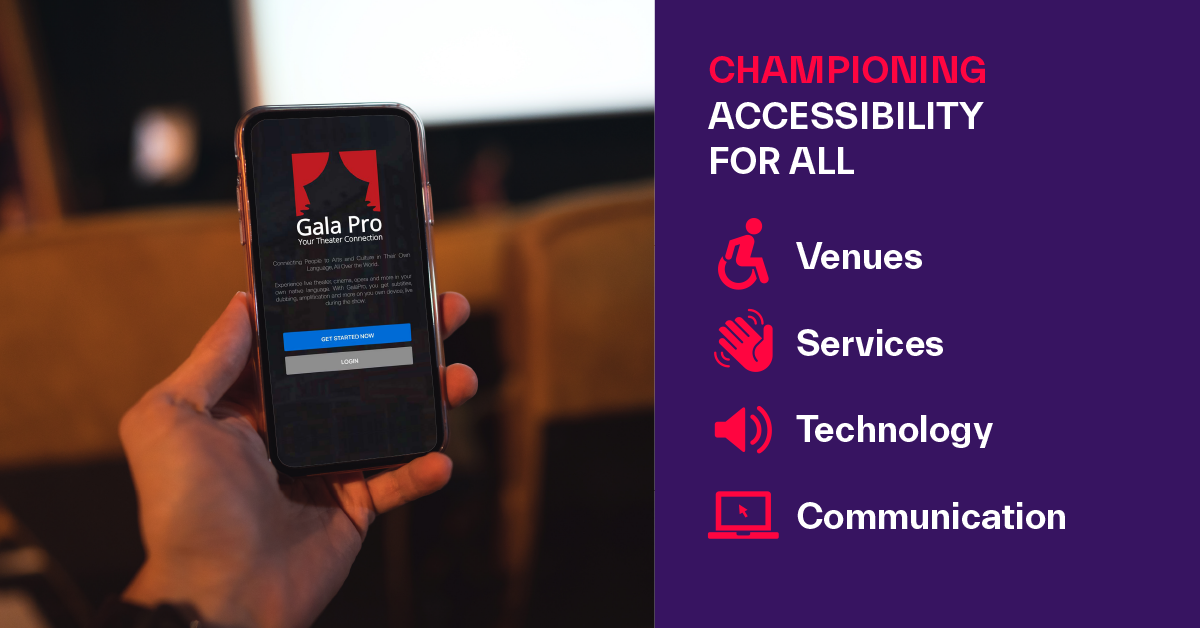 a hand holding a cell phone in a theater with the screen reading 