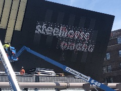 Close up of the neon sign bearing the name Steelhouse Omaha