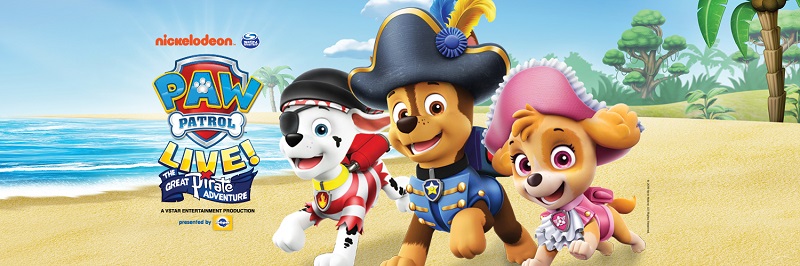 Paw Patrol dogs run along a beach