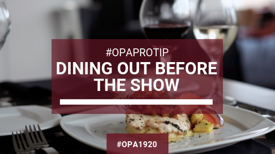 Photo of wine glasses on table with overlay text saying "#OPAProTip: Dining out before the show"