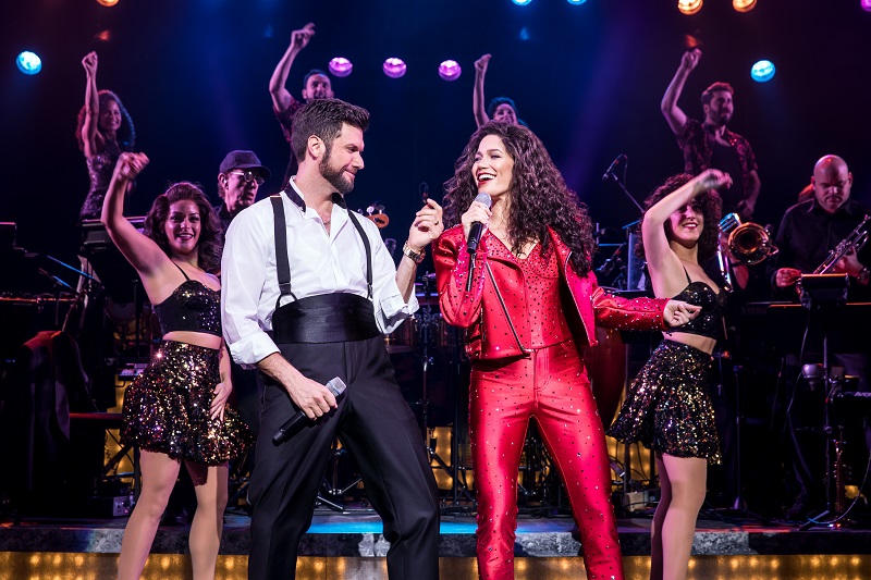 Actors playing Gloria and Emilio perform at the height of their career in the musical.